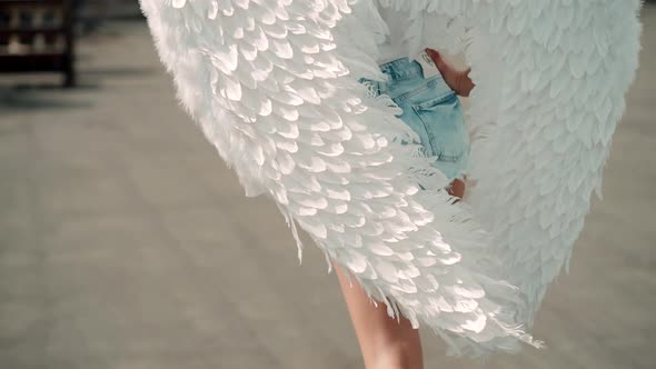 Woman Wear Booty Shorts and Angel Wings for Photo Shoot