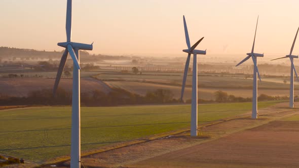 Modern wind farm at sunrise