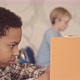 School Boy Using Smartphone during Lesson - VideoHive Item for Sale