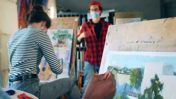 Art Students are Painting During a Class in the Studio alt
