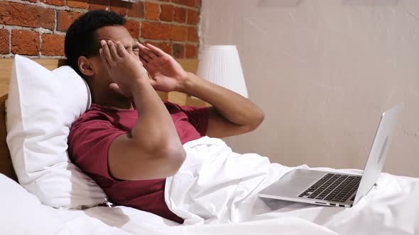 Tension and Headache, Frustrated African Man Working on Laptop, Stairs alt