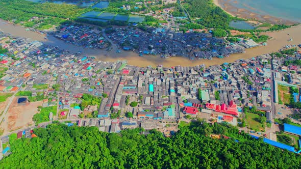 Aerial video of a drone flying over Pak Nam Chumphon alt