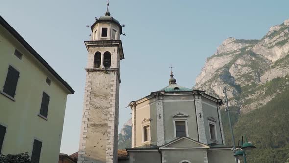 Medieval Inviolata Church, Riva del Garda, Italy. Slow Motion View of Bell Tower and Dome of Landmar alt
