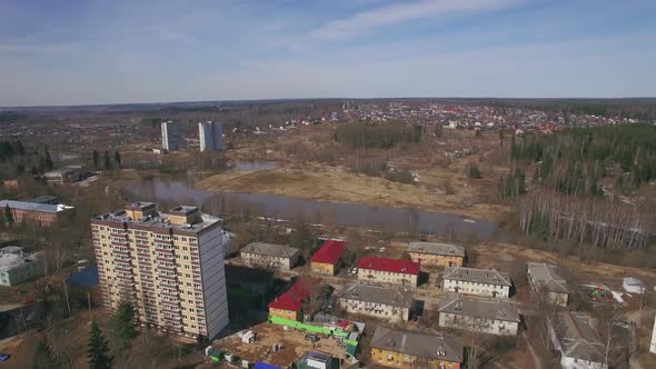 Aerial Shot of Township in City Outskirts, Spring View. Russia alt
