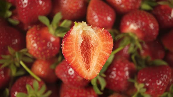 Juicy Sweet Strawberry On The Background Of Rotating Berry.