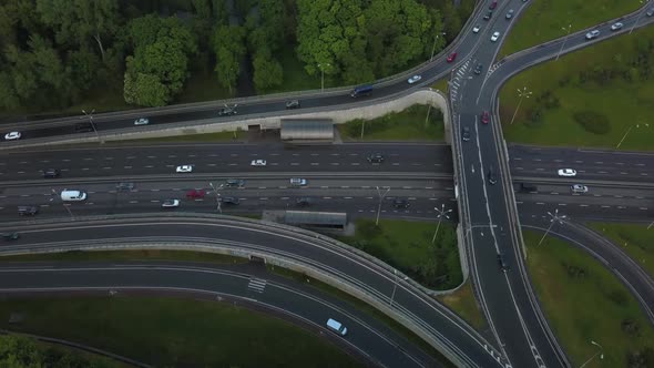 Aerial View Flying Over of Loaded Cars with Traffic Jam at Rush Hour on Highway with Bridge