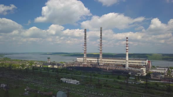 Thermal Power Plant on the Background of an Artificial Reservoir. Video From the Drone. Electricity