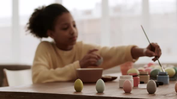 Lots of Colored Eggs and Person alt