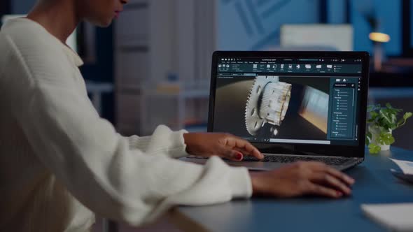 Tired African Designer Engineer Analyzing New Prototype alt