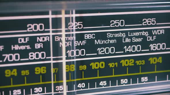 Tuning Analog Radio Dial Frequency on Scale of the Vintage Receiver alt