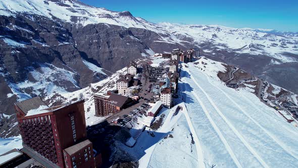 Panoramic view of Ski station centre resort at snowy Andes Mountains. alt