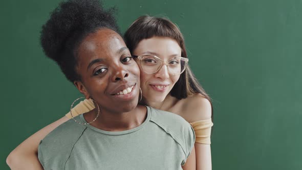 Multi-Ethnic Lesbian Couple Posing alt