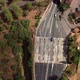 Aerial View of Cars Entering a Tunnel