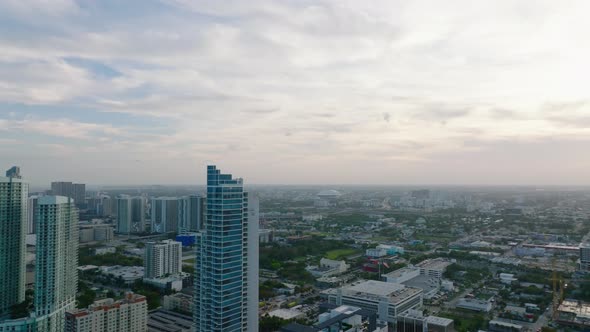 Fly Around Modern High Rise Apartment Building with Balconies alt