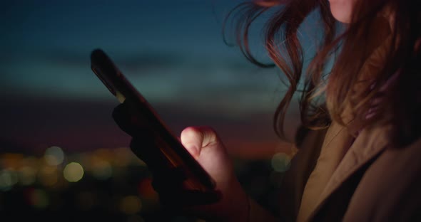 Close Up of Woman Scroll Through App Social Media alt