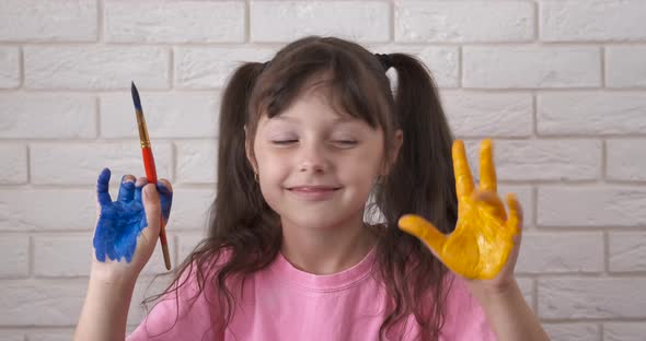 Child Draw with Colorful Hands at Home alt