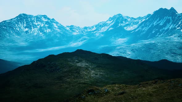 Mountain Gorge with Green Meadow Illuminated By the Sun alt