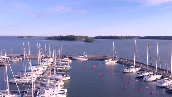 The White Yachts and Sailboats Docking on the Port Area in Helsinki