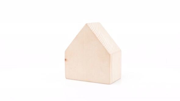 Mini wood house model roatation on white background, Planning buy Real Estate