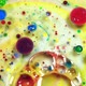 Colorful abstract bubbles and drops on the yellow and white water surface - VideoHive Item for Sale