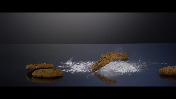 Falling cookies from above onto a reflective surface - COOKIES 188 alt