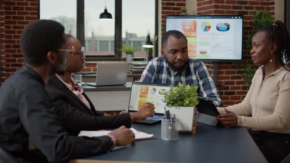 African American Team of People Meeting in Boardroom Office alt