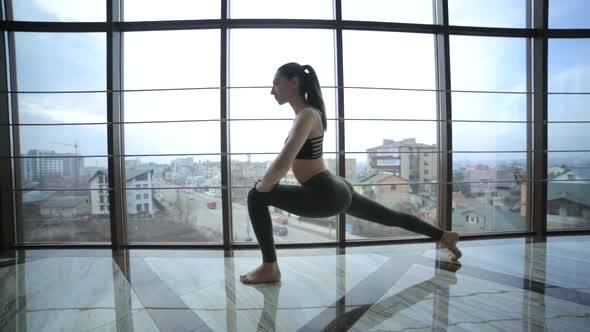 Beautiful yoga woman practice in a training hall . Yoga concept. alt