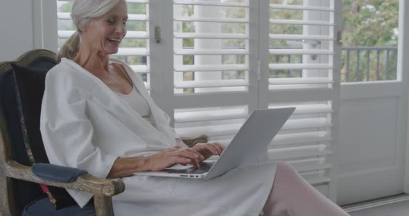 Senior woman alone at home alt