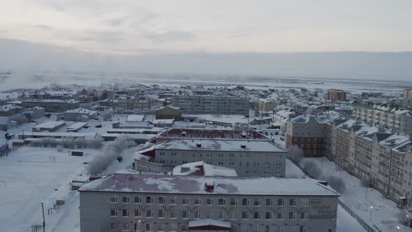 Establishing Shot on an Arctic City in a Harsh Winter