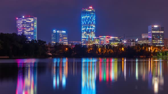 City skyline night time lapse, Bucharest Romania Office buildings at night alt