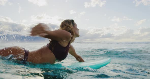 Young Woman Surfing alt