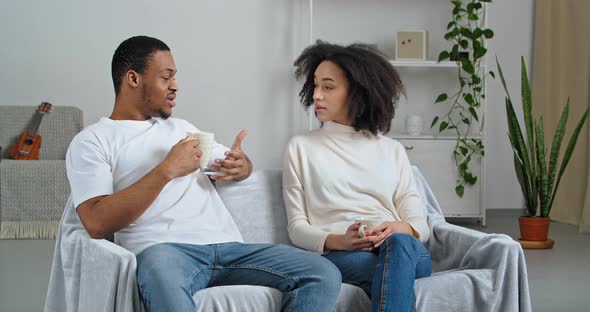 Afro American Couple Family Handsome Man and Curly Attractive Girl Wearing Casual Clothes at Home alt