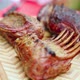 Hot Rack of Crispy Lamb Ribs on Wooden Cutting Board on Bbq Picnic Party - VideoHive Item for Sale
