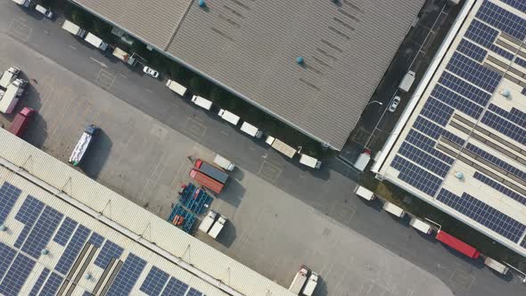 Solar panels on warehouse rooftop alt