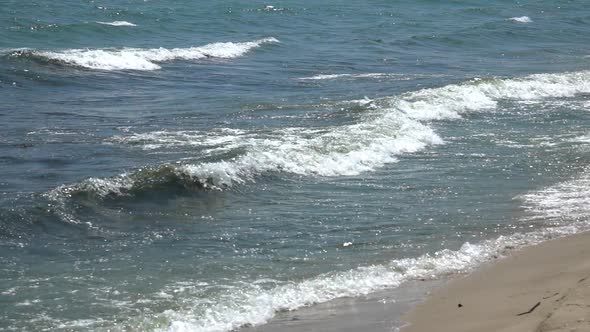 Sea waves crashes at beach