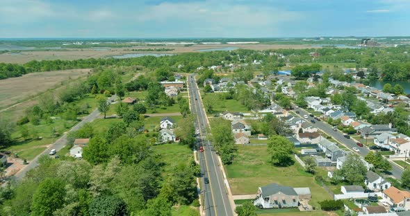 Aerial View of Single Family Homes a Residential District Sayreville Near Pond in New Jersey USA alt