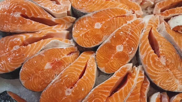 Salmon Pieces on Ice in a Supermarket