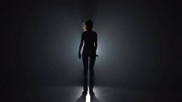 Girl in Sports Suit Doing Exercises in Kangoo Jumps Shoes alt