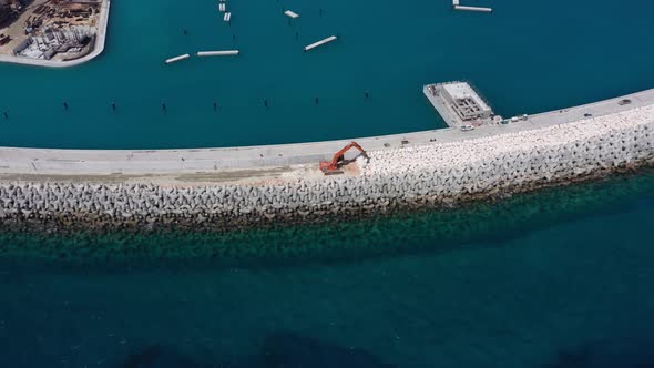 Aerial View of the Construction of the Stone Defense of the Marina