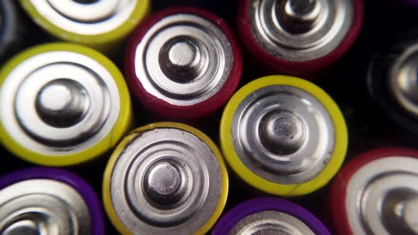 Various Close Up Background of Various Alkaline Batteries alt