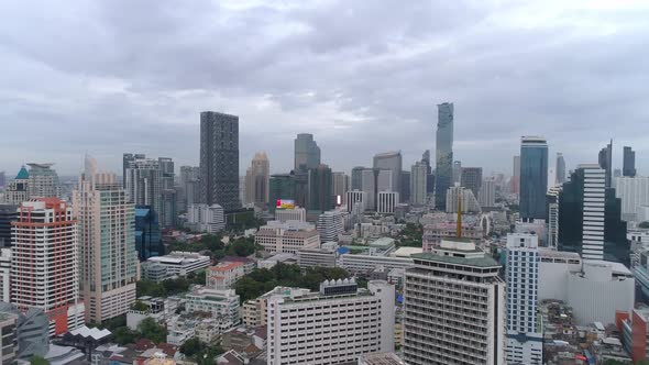 4k Aerial city view of Bangkok dowtnown, Flying over Bangkok, Thailand. alt