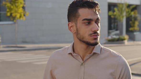 Closeup Portrait Serious Male Tourist Arabic Indian Business Man Guy Standing in City on Background alt
