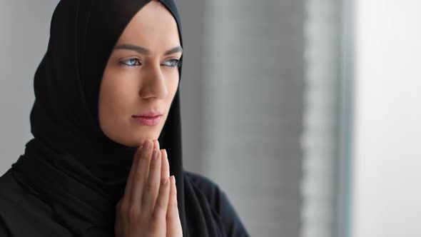 Traditional Arabic Lady Praying with United Hands Dreaming Asking Allah alt