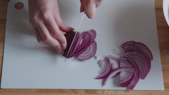 Slicing Red Onion for Spicy Meal