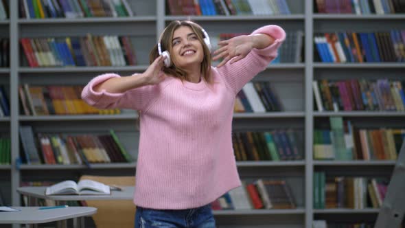 Beautiful Woman in Headphones Having Fun of Music alt