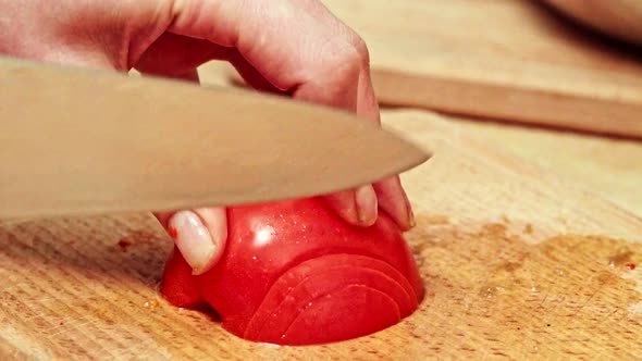 Chef Cutting Fresh Tomatoes