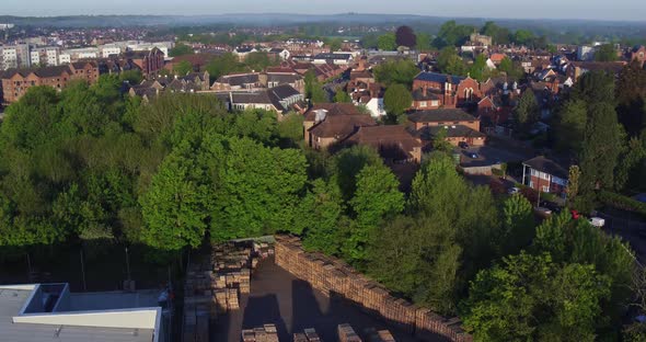 Rising aerial shot with seagulls which reveals the historic town of Tonbridge, Kent, UK alt