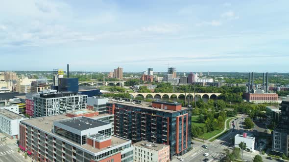 Drone aerial view revealing the Stone Arche Bridge and Mississippi River alt