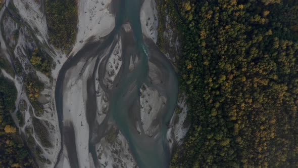 Aerial view Laba river flood, forest at dawn, autumn, natural water earth patterns, Caucasus Russia alt