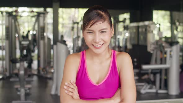 Asian healthy sport woman trainer with sportswear smile looking at camera feel cheerful and fresh.